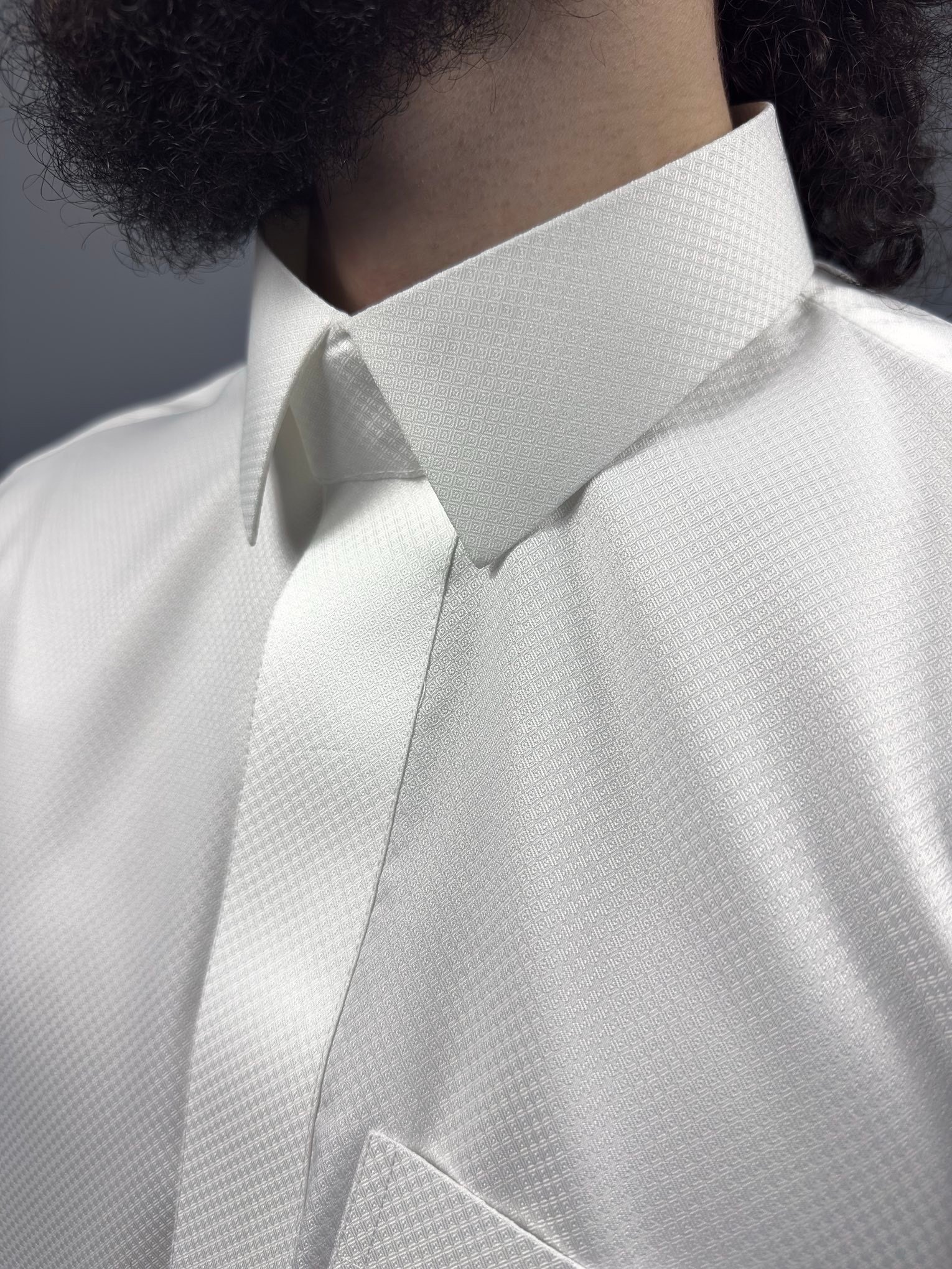 Qamis Talib Damier